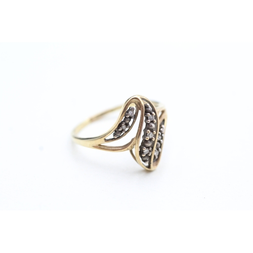 247 - 9ct gold diamond set dress ring (2.4g) Size R