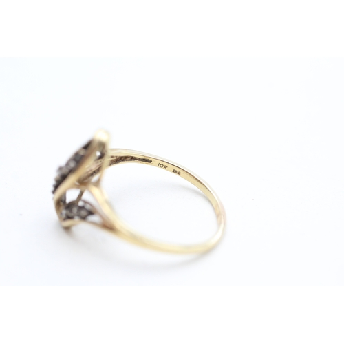 247 - 9ct gold diamond set dress ring (2.4g) Size R