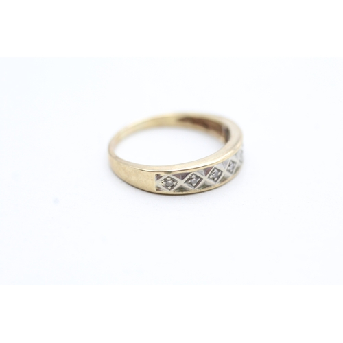 248 - 9ct gold diamond set seven stone eternity ring (2.1g) Size M