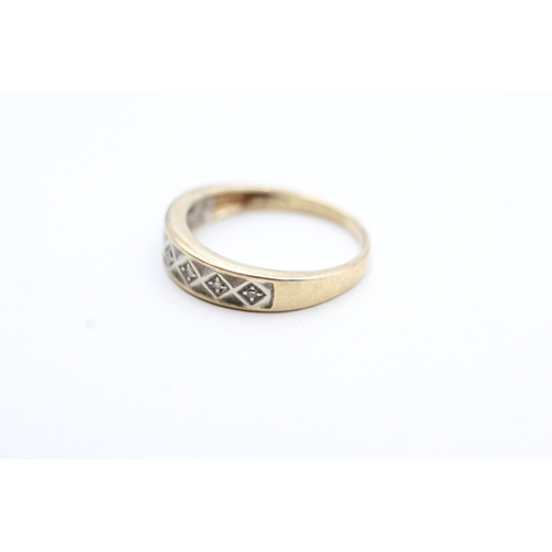 248 - 9ct gold diamond set seven stone eternity ring (2.1g) Size M