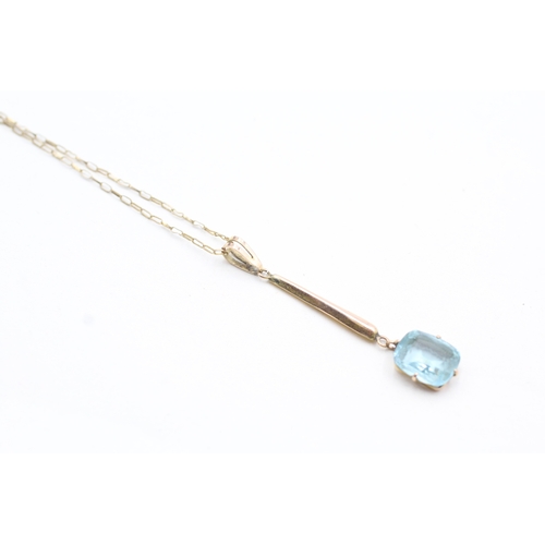 26 - 9ct gold aquamarine paste drop pendant on chain (1.8g)