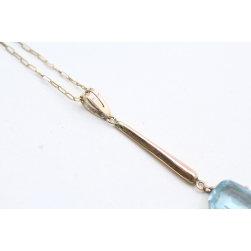 26 - 9ct gold aquamarine paste drop pendant on chain (1.8g)