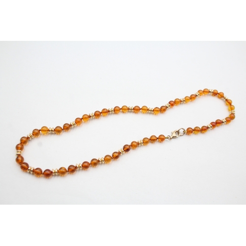 29 - 9ct gold amber and gold spacer beaded necklace (8.4g)