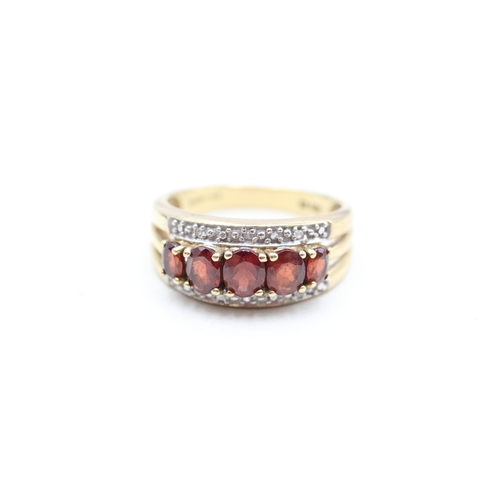 3 - 9ct gold diamond and garnet set band ring (4.4g) Size Q