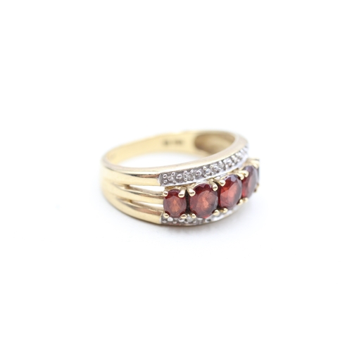 3 - 9ct gold diamond and garnet set band ring (4.4g) Size Q