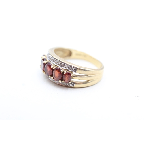 3 - 9ct gold diamond and garnet set band ring (4.4g) Size Q