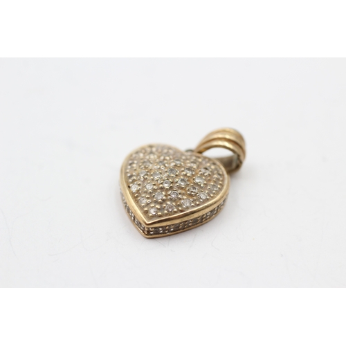 37 - 9ct gold diamond heart cluster pendant (3.1g)