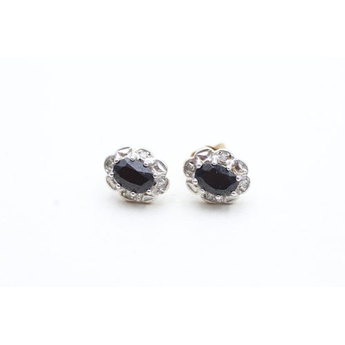 38 - 9ct gold diamond and sapphire set cluster stud earrings (1.5g)