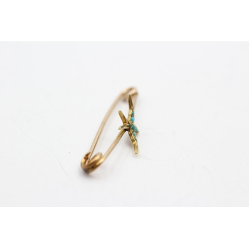 41 - 9ct gold turquoise swallow bar brooch (1.2g)