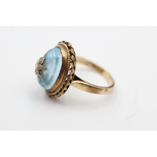 47 - 9ct gold blue topaz and seed pearl ring (5.3g) Size K