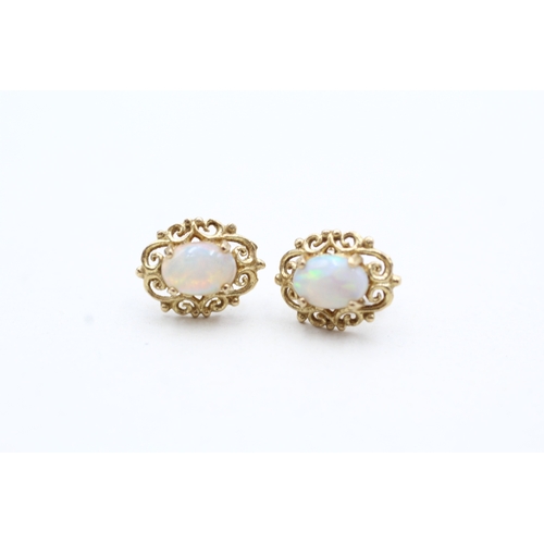 49 - 9ct gold opal stud earrings (1.5g)