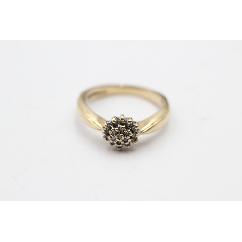 51 - 9ct gold diamond cluster ring (2.6g) Size L