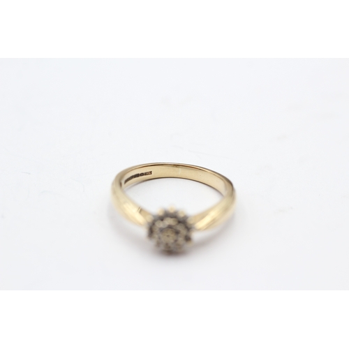 51 - 9ct gold diamond cluster ring (2.6g) Size L