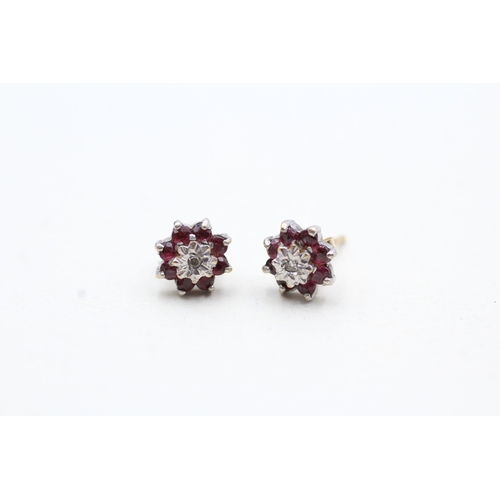 55 - 9ct gold ruby and diamond halo stud earrings (1.1g)