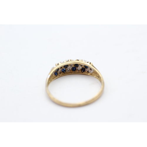 61 - 9ct gold diamond and sapphire cluster row ring (2.5g) Size U