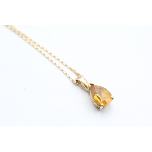 66 - 9ct gold pear cut citrine set pendant necklace (2.5g)