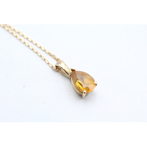 66 - 9ct gold pear cut citrine set pendant necklace (2.5g)