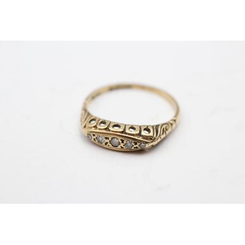 67 - 9ct gold diamond boat ring (2g) Size Q