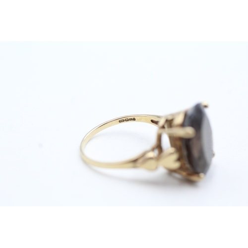 77 - 9ct gold smoky quartz cocktail ring with heart shoulder detail (4.1g) Size N