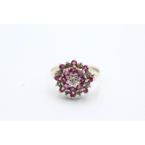 78 - 9ct gold ruby and diamond cluster halo ring (2.1g) Size L