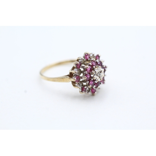 78 - 9ct gold ruby and diamond cluster halo ring (2.1g) Size L