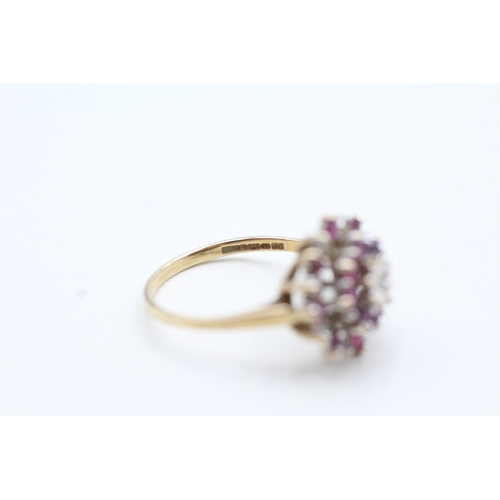 78 - 9ct gold ruby and diamond cluster halo ring (2.1g) Size L