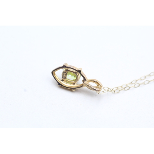 82 - 9ct gold oval cut peridot set pendant necklace (1.4g)