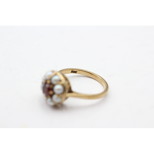 90 - 9ct gold garnet and cultured pearl halo ring (3.7g) Size O