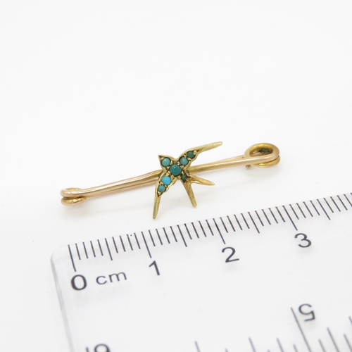 41 - 9ct gold turquoise swallow bar brooch (1.2g)