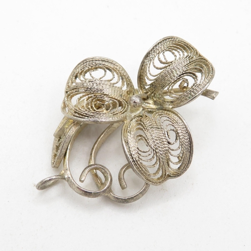 340 - 8x silver filigree design brooches   56.5g