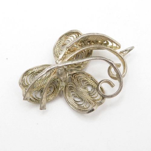 340 - 8x silver filigree design brooches   56.5g