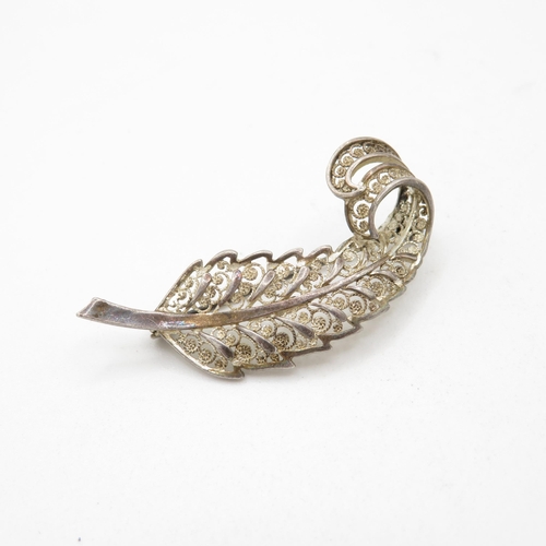 340 - 8x silver filigree design brooches   56.5g