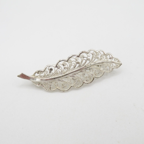 340 - 8x silver filigree design brooches   56.5g