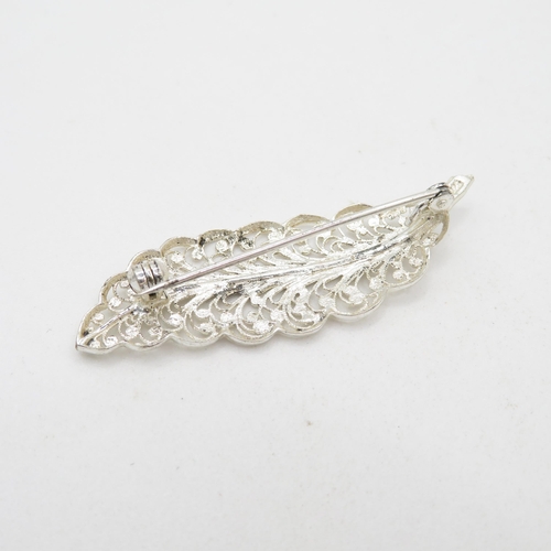 340 - 8x silver filigree design brooches   56.5g