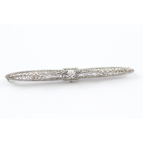 101 - 14ct gold diamond set Art deco brooch (4.9g)