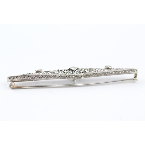 101 - 14ct gold diamond set Art deco brooch (4.9g)