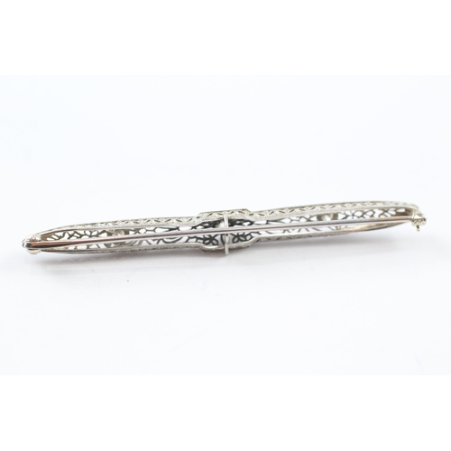 101 - 14ct gold diamond set Art deco brooch (4.9g)