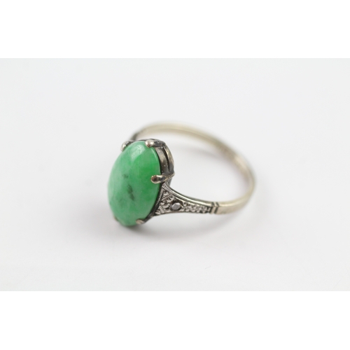 104 - 9ct white gold jade and diamond dress ring (2.2g) Size J 1/2