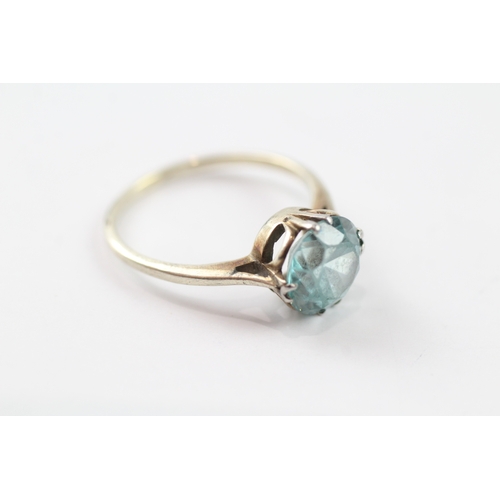 110 - 9ct gold blue zircon solitaire ring (2.4g) Size Q 1/2