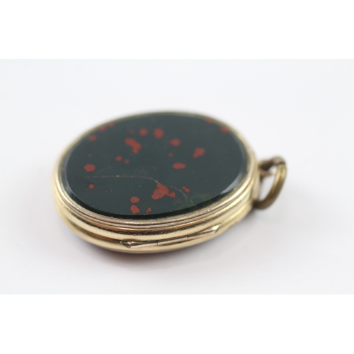 115 - 9ct gold bloodstone and agate locket (11.1g)