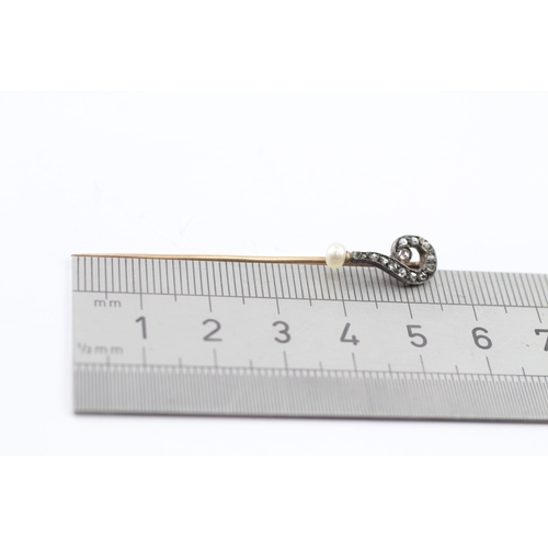 116 - 15ct gold and silver diamond and pearl set stick pin (1.6g)