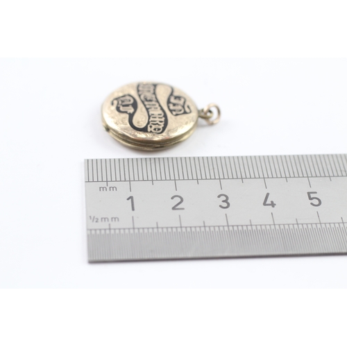 118 - 9ct gold back and front locket (6.3g)