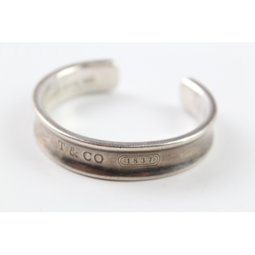 122 - A silver bangle by Tiffany and Co (42g)