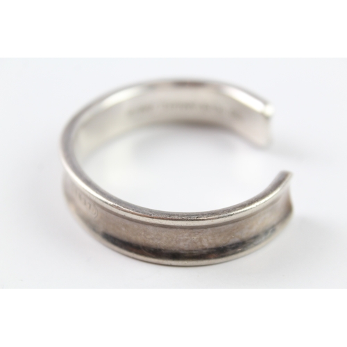 122 - A silver bangle by Tiffany and Co (42g)