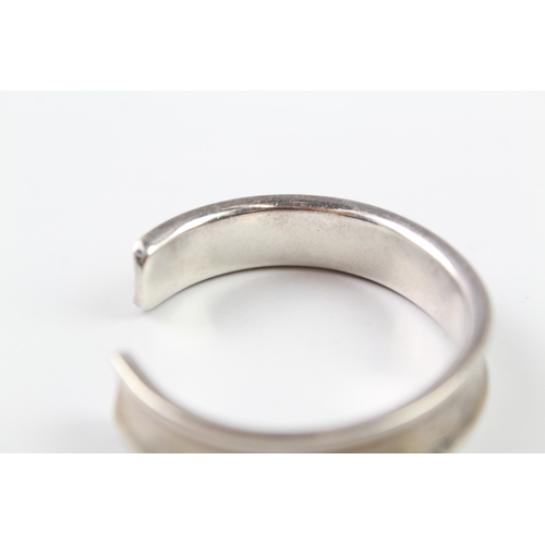 122 - A silver bangle by Tiffany and Co (42g)