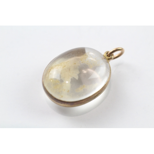 130 - 9ct gold antique pool of light locket (9.5g)