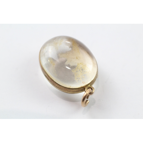 130 - 9ct gold antique pool of light locket (9.5g)