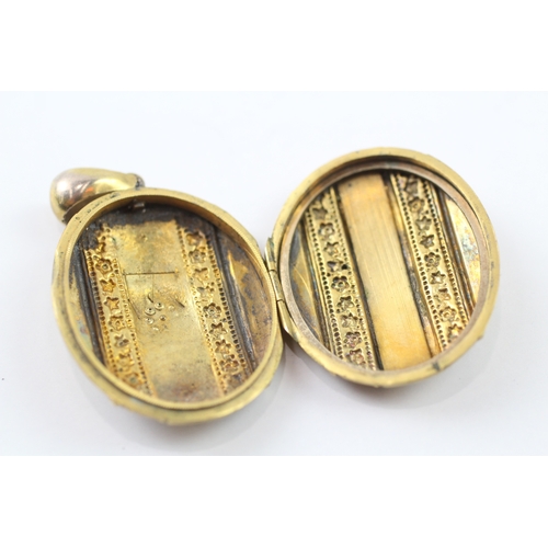 132 - 9ct gold Victorian pearl and shell detail locket (10.1g)