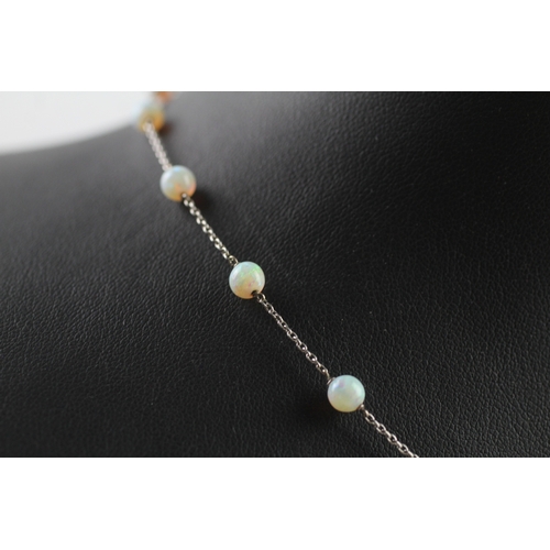 138 - 9ct white gold opal necklace (3.5g)