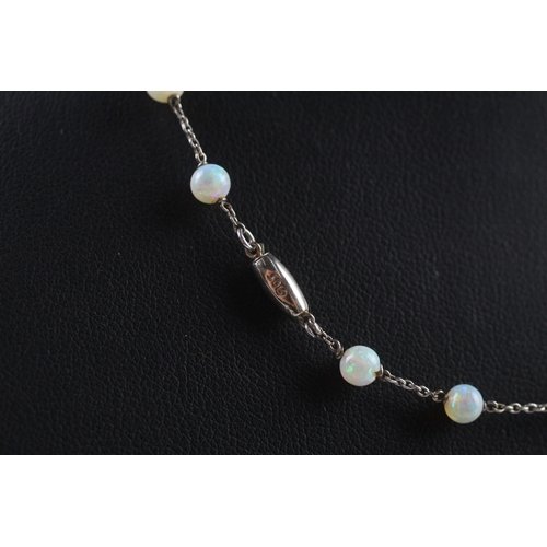 138 - 9ct white gold opal necklace (3.5g)